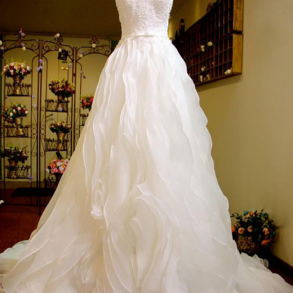 Sweetheart Organza A-line Wedding Dress Featuring..