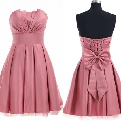 Strapless Ruched Short Homecoming Dress Featuring..