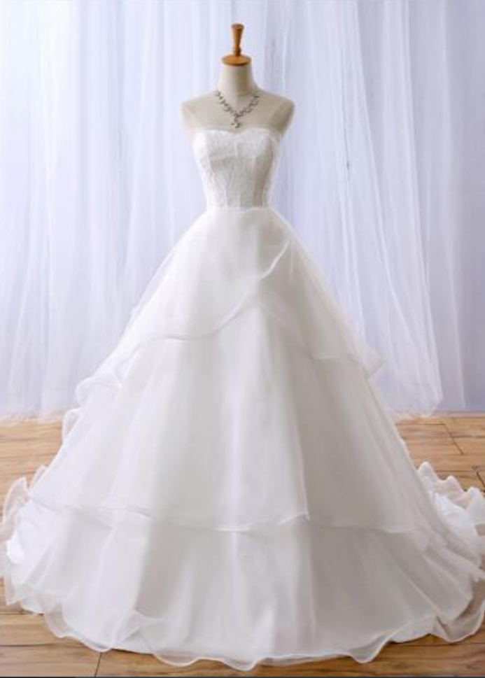 Strapless Sweetheart A-line Wedding Dress With Curled Hemline And Sweep Train